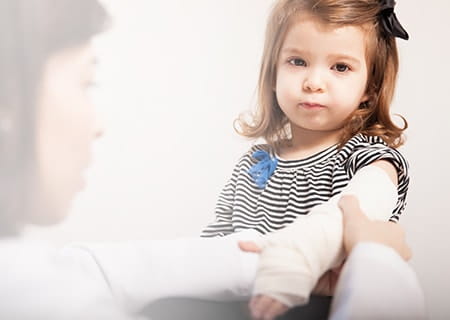 Girl at pediatric clinic